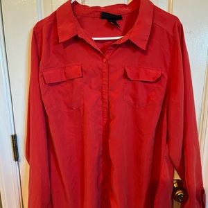 Red/orange sleeves roll up and button